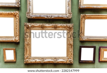 Antique art fair gallery frame on royal green wall at auction house or museum exhibition, blank template with empty white copyspace for mockup design, artwork concept Royalty-Free Stock Photo #2282147999