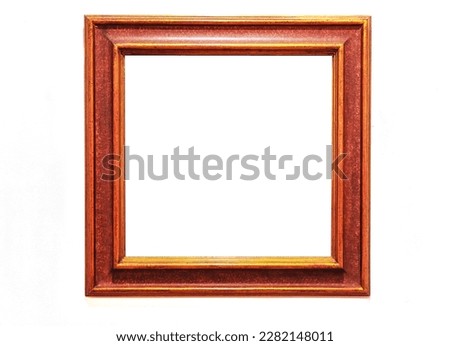 Ancient wooden photo frame isolated on white background.