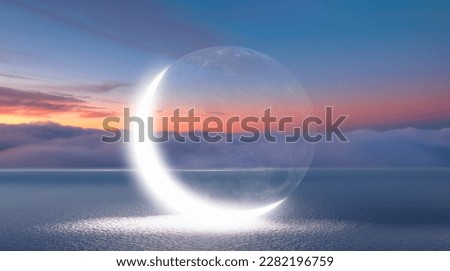 Abstract background of amazing crescent moon over the sea at sunset Royalty-Free Stock Photo #2282196759
