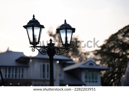 Modern style lamp for exterior lighting of residential houses.