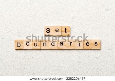 set boundaries word written on wood block. set boundaries text on table, concept. Royalty-Free Stock Photo #2282206497