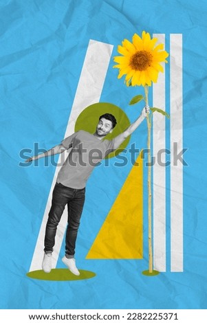 Vertical collage picture of black white gamma mini guy arm hold big growing sunflower isolated on blue painted background