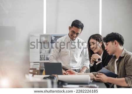 Civil engineer teams meeting working together wear worker helmets hardhat on construction site in modern city. Foreman industry project manager engineer teamwork. Asian industry professional team. Royalty-Free Stock Photo #2282226185