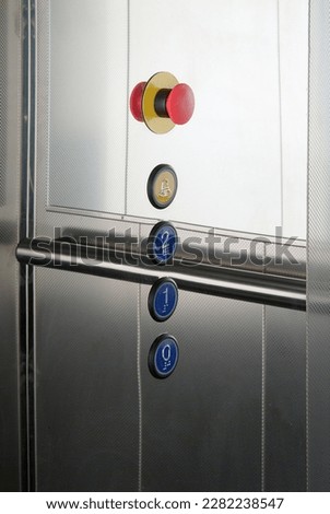 Detail of lift button panel with reflex