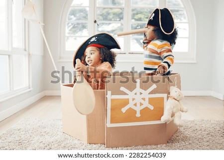 Playing, box boat and pirate children role play, fantasy imagine or pretend in cardboard container. Telescope, fun home game or sailing black kids on Halloween cruise adventure with yacht captain Royalty-Free Stock Photo #2282254039