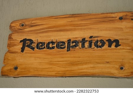 Reception outdoor sign, rot resistant wooden rustic look and yet has sophistication and elegance. Have this sign custom carved with reception written on it.