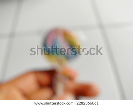 defocused photo of sweet and delicious colorful lollipop candy