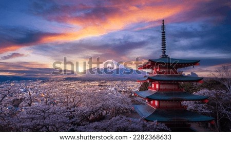 Red chureito pagoda with cherry blossom and Fujiyama mountain on the night and morning sunrise time in Tokyo city, Japan Royalty-Free Stock Photo #2282368633