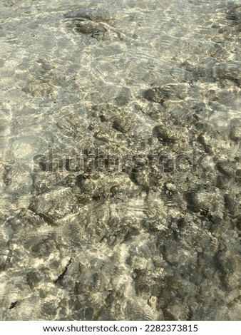 15 Jan 2022; krabi Thailand : went to the sea in Krabi. The sea water is very clear. The incident light causes a beautiful watermark.