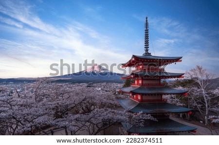 Red chureito pagoda with cherry blossom and Fujiyama mountain on the night and morning sunrise time in Tokyo city, Japan Royalty-Free Stock Photo #2282374511