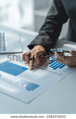 Investor increases revenue share small business stock market report and financial dashboard with key performance indicators (KPI) finance chart of business intelligence (BI) Royalty-Free Stock Photo #2282376053