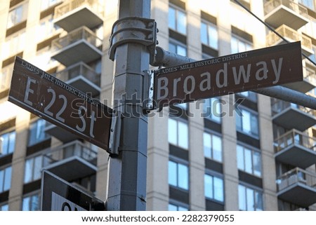Brown East 22nd Street and Broadway historic sign in Midtown Manhattan in New York City