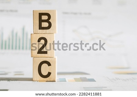 B2C acronym, business to customer client concept. Wood blocks on desk. High quality photo