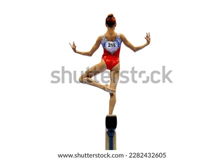back female gymnast athlete balancing on balance beam gymnastics, sports included in summer games 