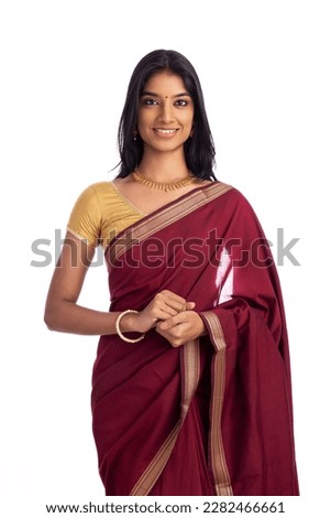 Pretty Indian young girl dress up  saree on white. Royalty-Free Stock Photo #2282466661