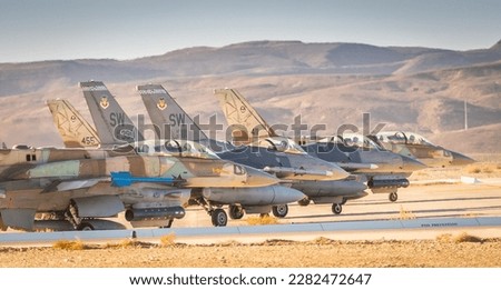 U.S. Air Force pilots from the 55th Expeditionary Fighter Squadron taxi alongside the Israeli Air Force during Desert Falcon in Israel, Jan. 16, 2022.  Royalty-Free Stock Photo #2282472647