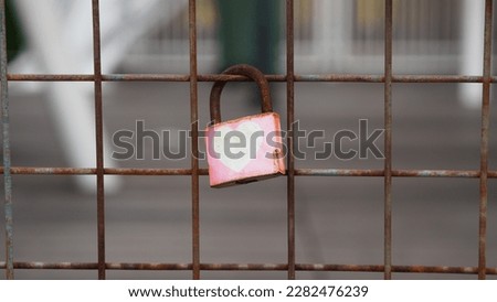 A padlock with a love symbol on the body