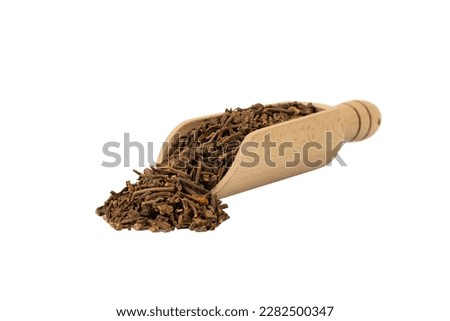 Valerian herb root  in wooden scoop isolated on white background. Valeriana officinalis. used in herbal medicine as a tranquillizer and to treat insomnia, anxiety, hypertension, pain relief. Royalty-Free Stock Photo #2282500347