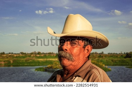 portrait of a mexican man wearing sombrero and mustache. #uniquesself Royalty-Free Stock Photo #2282514931