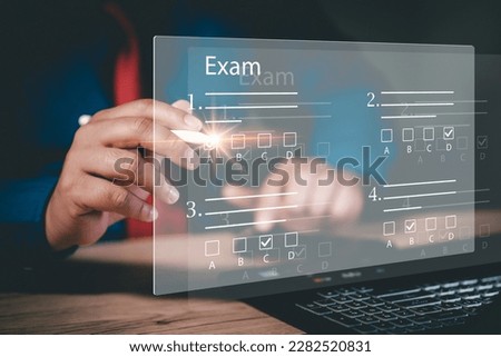online exam concept, choose correct answer in test. checklist and online testing on laptop. online exam test with laptop. on-line questionnaire results on desktop. quiz.