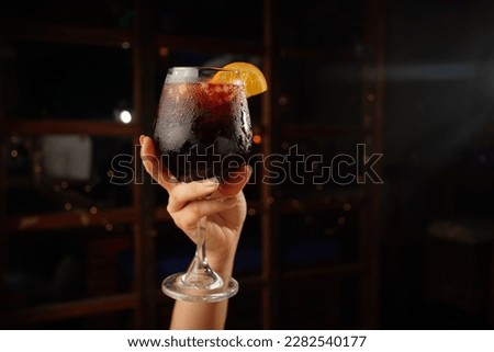 Sangria cocktail with red wine at the bar with blurred background Royalty-Free Stock Photo #2282540177