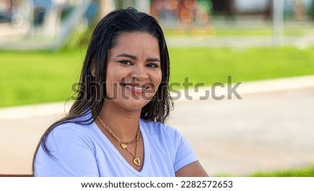 Brazilian Latin woman in a square
