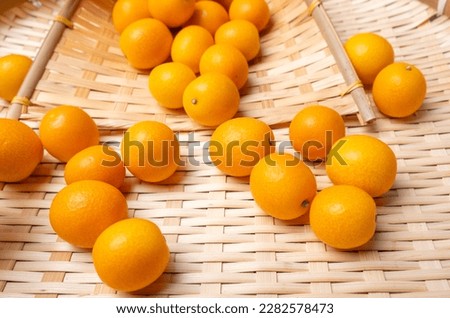 sweet and sour fruit kumquat Royalty-Free Stock Photo #2282578473