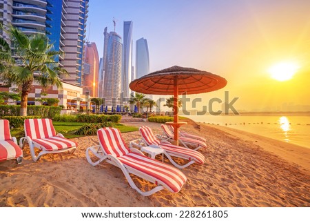 Sunrise on the beach at Perian Gulf in Abu Dhabi Royalty-Free Stock Photo #228261805
