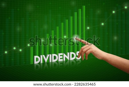 Dividend Growth and Profits with Finger pointing on the graph. Royalty-Free Stock Photo #2282635465
