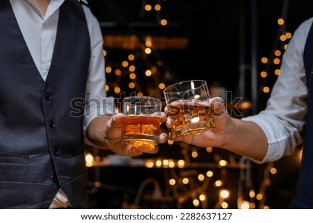 whiskey, for a friendly party in a bar or a restaurant. Royalty-Free Stock Photo #2282637127