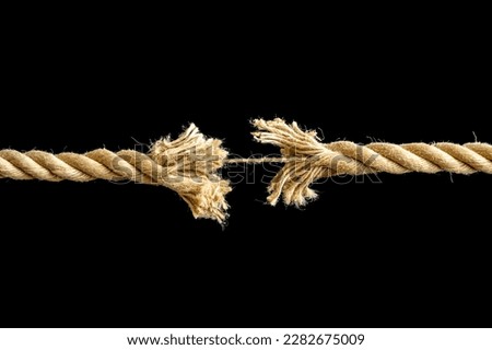 Rope just before the crack against black background