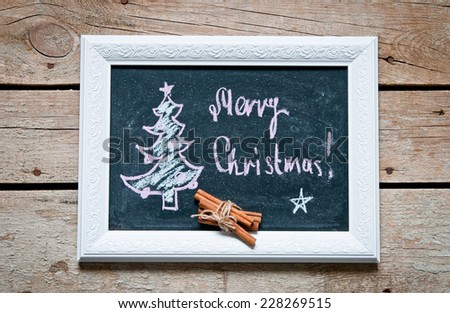christmas tree drawing on blackboard
