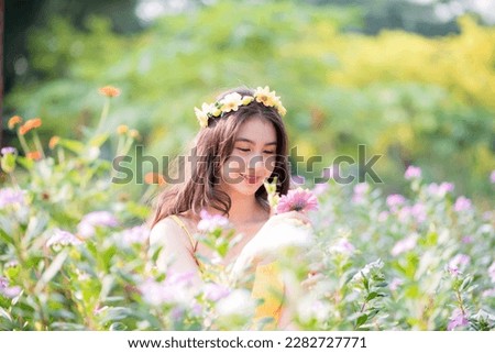 Portrait of an Asian woman in her own lifestyle in a park.