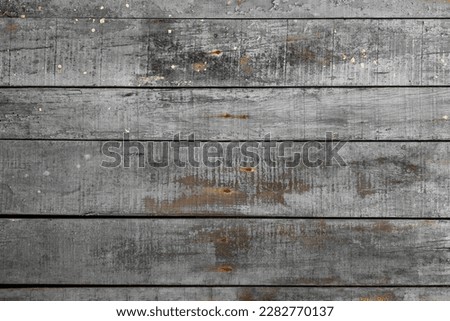 Old grey painted rustic wooden planks wall, distressed  background or texture