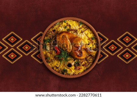 Chicken Mandy top view The national Saudi Arabian dish chicken kabsa with rice mandi, arab cuisine.                         Royalty-Free Stock Photo #2282770611
