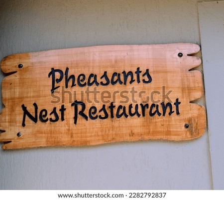 Wooden rustic sign board. outdoor sign, rot resistant wooden rustic look and yet has sophistication and elegance. Have this sign custom carved. India. Jungle Resort. Environment friendly.