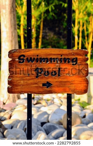 Wooden rustic sign board. outdoor sign, rot resistant wooden rustic look and yet has sophistication and elegance. Have this sign custom carved. India. Jungle Resort. Environment friendly.