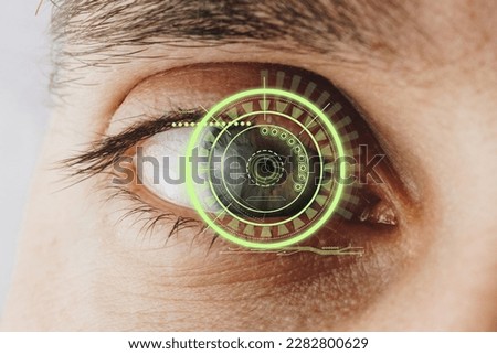 Eye with a futuristic vision of a person, control and protection of people, access control and security. Concept: DNA system science and technology, artificial intelligence. Scanning, security Royalty-Free Stock Photo #2282800629