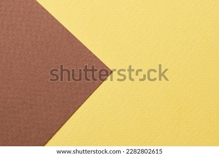 Rough kraft paper background, paper texture brown yellow colors. Mockup with copy space for text