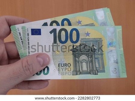 Banknotes of 100 Euros - donation