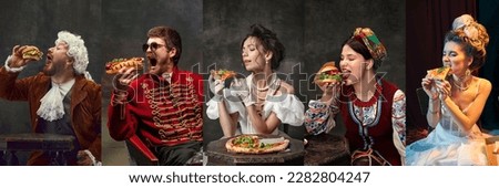 Fast food. Medieval men and women in royal clothes posing with junk food against dark vintage background. Concept of comparison of eras, modernity and renaissance, baroque style. Creative collage. Royalty-Free Stock Photo #2282804247