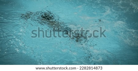 Abstract photo lifestyle, nature background. Unrecognizable person body deep under water, look at surface. Mystery mood. Concept of weightless, uncertain future, drown in obscurity, childhood issues