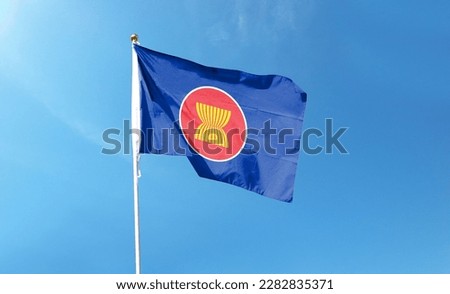 ASEAN flag in the cloudy sky. waving in the sky Royalty-Free Stock Photo #2282835371