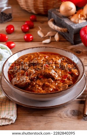 Traditional goulash soup with stew and paprika. Bograch. Royalty-Free Stock Photo #2282840395