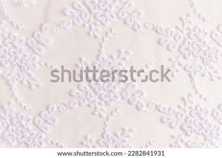 Beautiful lace white background. white lace with small flowers. wedding background Royalty-Free Stock Photo #2282841931