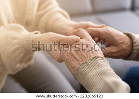 Head shot old male pensioner involved in rehabilitation procedure with caring young physiotherapist. retired man with walking disability feeling thankful for professional help. Royalty-Free Stock Photo #2282865123
