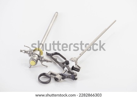 Closeup of Reusable Laparoscopic Surgical Tool on White Background. Product photography of surgical tools. 