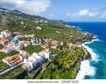 Aerial View at San Andres village near Los Sauces at northeast of La Palma Island. Green Volcanic Hills, and the Coast of the Atlantic Ocean. Canary Islands, Spain.  Royalty-Free Stock Photo #2282873333