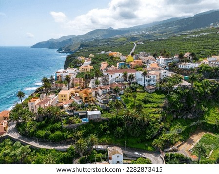 Aerial View at San Andres village near Los Sauces at northeast of La Palma Island. Green Volcanic Hills, and the Coast of the Atlantic Ocean. Canary Islands, Spain.  Royalty-Free Stock Photo #2282873415