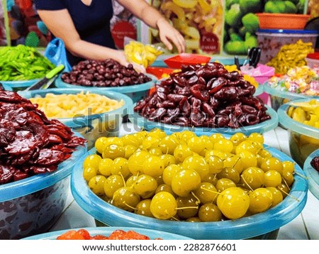 Variety of candied fruit in the market
